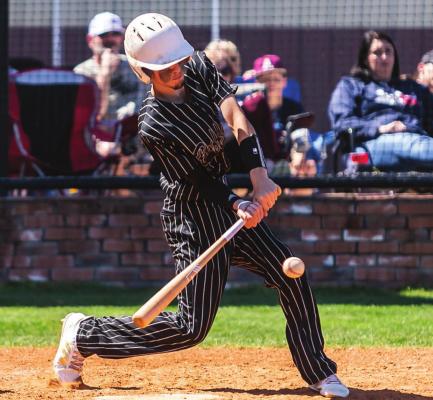 BRENNAN McDONEL makes a swing on a pitch in the lower part of the strike zone to rip a hit for the Hugo Buffaloes during weekend baseball action. Above, McDonel strokes a hit in the Buffaloes’ 12-3 win over Atoka. (Below)