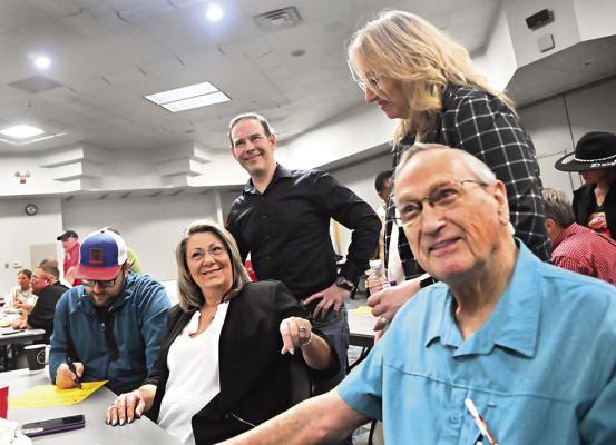 TEAMWORK — Working through a teamwork assignment by guest speaker Shade Dill, were these members of the Hugo Chamber: Colby Bryant , Tina Bunn, Chris Cannon, Valerie Powell and Dr. Charles Elswick. HUGO NEWS PHOTO / Stan Stamper