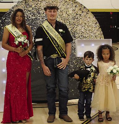 DAYJANA ADKISM was crowned Homecoming Queen and is flanked by King, Brayden Baker. The flower-girl and ringbearer were Azaria Sims and Brax Davis.