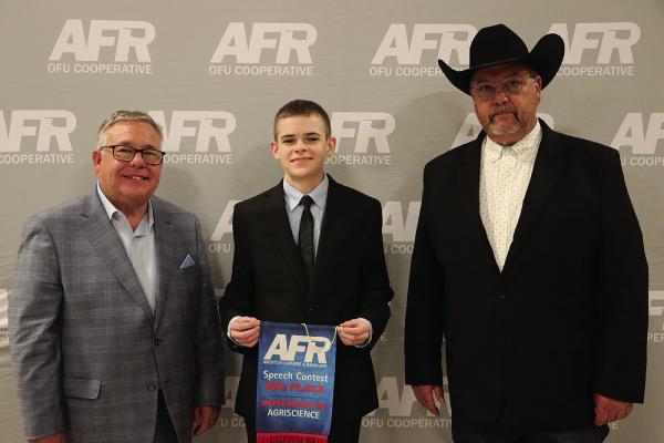 Pictured: AFR Cooperative President Scott Blubaugh, Creed Pope and AFR Cooperative Vice President Toby Wallace. Not pictured is Riley Pope.)