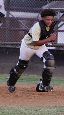 ISAIAH WIGGINS hustles for a throw to home plate during recent Hugo Buffalo summer baseball action. Under First Year Head Coach Scott Schier, the Buffaloes have one of the biggest squads from middle school through high school in recent years and are hoping to become more competitive in District play next year. Hugo News Photo / Stan Stamper