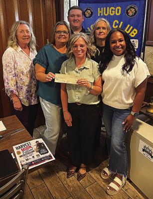 The Hugo Lions Club recently welcomed guest Amy White, who spoke about the Harvest Moon Festival to be held on Oct. 31 at Lions Park The Club donated $500 to help with the event. Pictured are Susan Brewer, President Royce Chandler, Dusty Williams, Amy White, Brandy Eller and Lindsey Adams