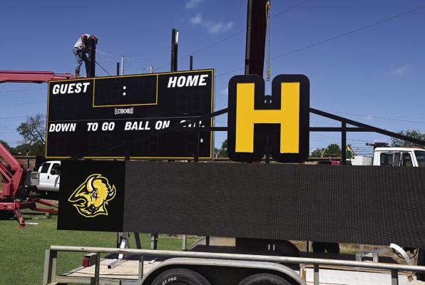 BUFFALOES GET NEW SCOREBOARD! Hugo Buffalo fans are in for a treat this season, as a modern new multi-media scoreboard will be operational for the opening scrimmage Aug. 22. Contributed by AmeriState Bank, the new board has new video capability that will add some new features to game reports. Hugo News Photo / Stan Stamper