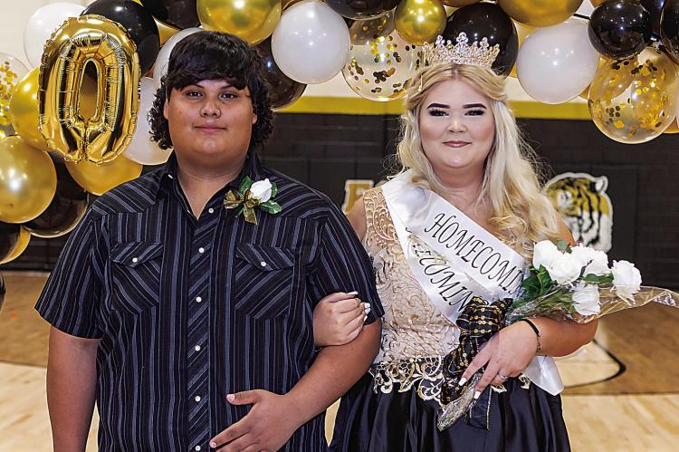 Stormey Wyatt was crowned the Fort Towson Basketball Homecoming Queen last week during the coronation ceremony. She was escorted by Mikha Thomas. For more information and the rest of the Homecoming Court, see today’s Sports, pages 1B and 2B. Hugo News / Bobby Hamill