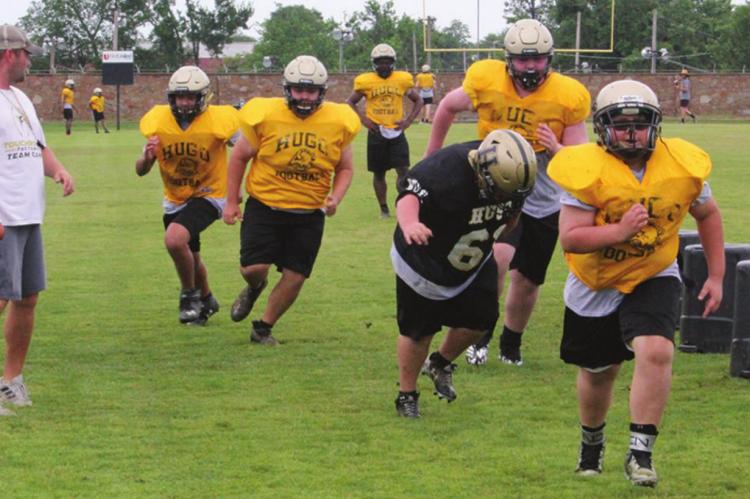 Coach Gross leads Buffaloes through Spring drills.... NEW BUFFALO HEAD COACH Krystopher Gross takes a group of Buffalo defenders through spring drills this week. Despite almost daily rain, the team has a strong number of future Buffaloes (48) involved in spring training and Coach Gross reports a number of very promising players at crucial positions for the 2021 Buffaloes Hugo News Photo / Stan Stamper