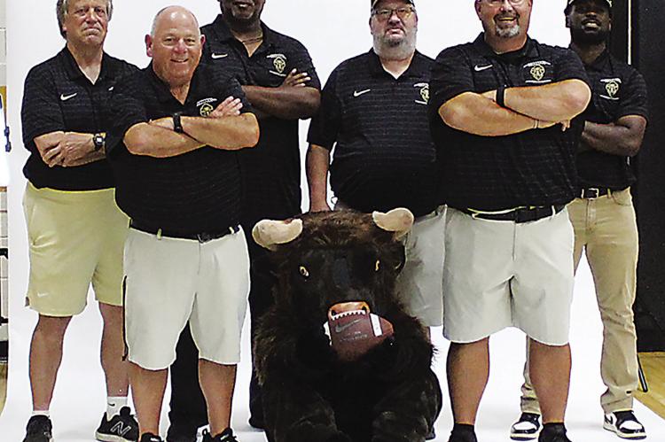 Coaches include: Danny Groat, Mark Rosa, Donald Dangerfield, Brad Greer, head coach Scott Schier and Tra Edwards.