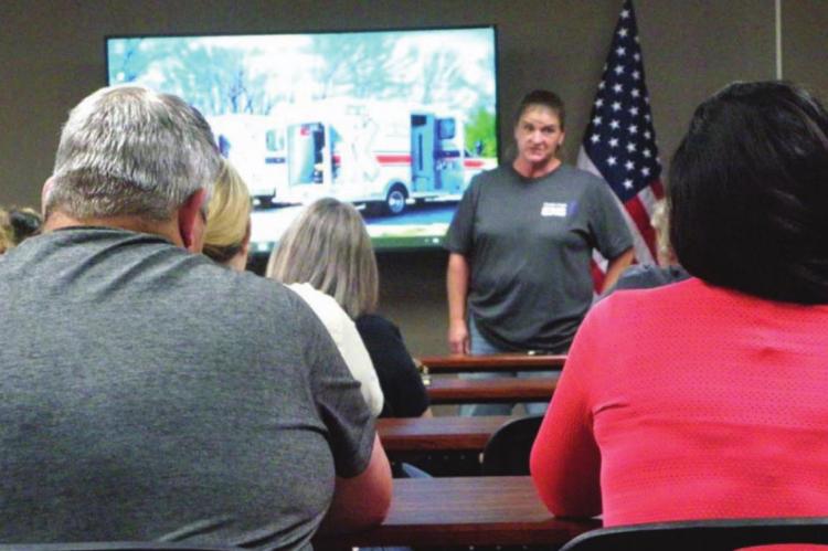 About 20 EMT students listen to words of support and encouragement offered by Choctaw County Ambulance Authority Lead Instructor Sara Richmond. Photo Courtesy / Sonya Campbell