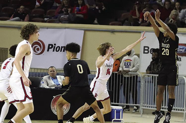 LORENZO KING turns loose of a three-point shot early in last week’s Oklahoma Class 3A Mens Basketball playoffs at the State Fairgrounds stadium in Oklahoma City. The shot was one of only two treys the Buffaloes would score throughout the entire game at the Big House’s last State Championship Tournament. Hugo News Photo / Kelli Stacy