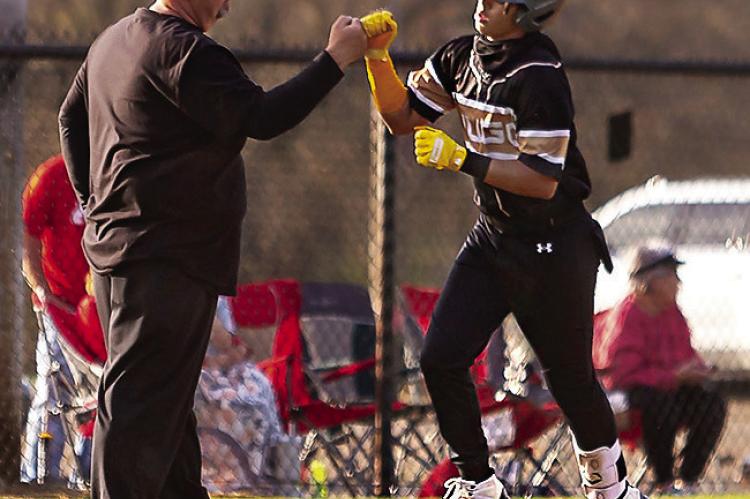 MALIKI GILLEAN ripped the Buffaloes’ first homerun of the season last week against Sulphur and gets a congratulatory fist bump from head coach Scott Schier as he rounds third base. Currently leading the Buffaloes at the plate with a .360 batting average is D.K. Wilson (.429 OBP with nine hits), followed by Jayka Santillan (313), Dakota Coulter, Colby Worthy and Trystunn Fleeks (.250). Hugo News Photo / Bobby Hamill