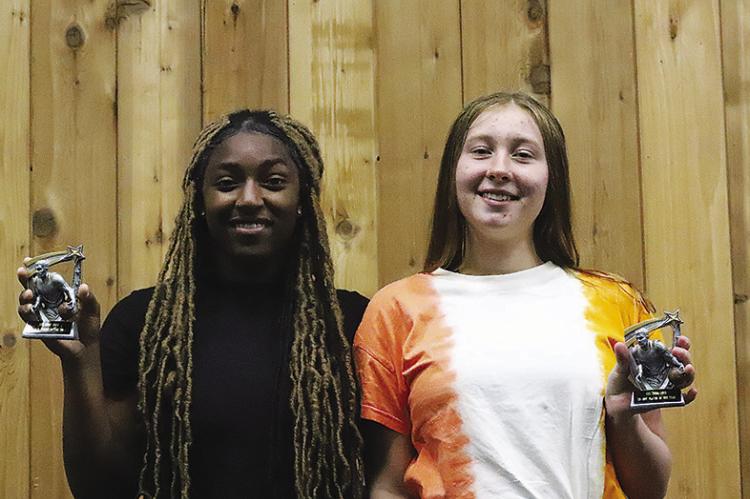 Keshawna Scroggins and Calista Kelly were named co-offensive players of the year for basketball.