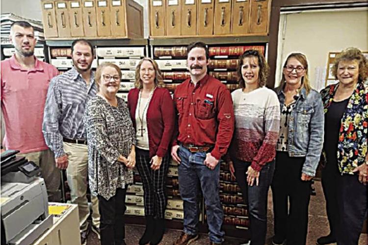 The Kiamichi Conservation District received a REAP Grant on Feb. 15 in the amount of $59,708. The monies will go to purchase a district vehicle, two 500-gallon sprayers and a hay buggy. Pictured (l to r): Johnny Sokolosky, Travis Dill, Lisa Payne, Kim Rose, John McQuaig, Kylee Edge, Kim Bush and Linda Loper.