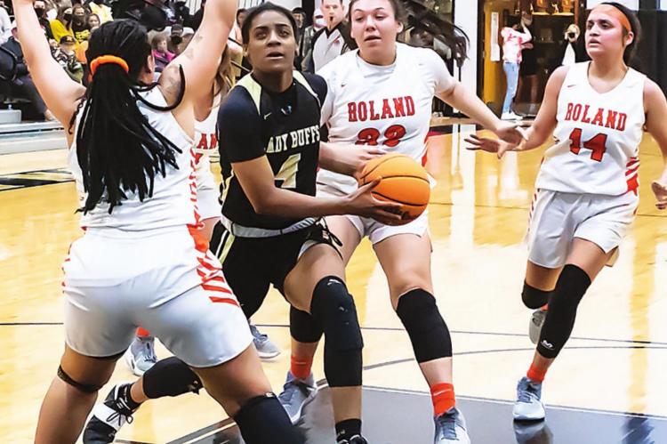 HUGO BUFFALO SENIOR JORDAN HOLMAN has amazed fans all season long with her ability to knife through opposing defenses as shown above. She will lead the Lady Buffs at State Fairgrounds Arena in Oklahoma City Wednesday night. Hugo News Photo / Bobby Hamill