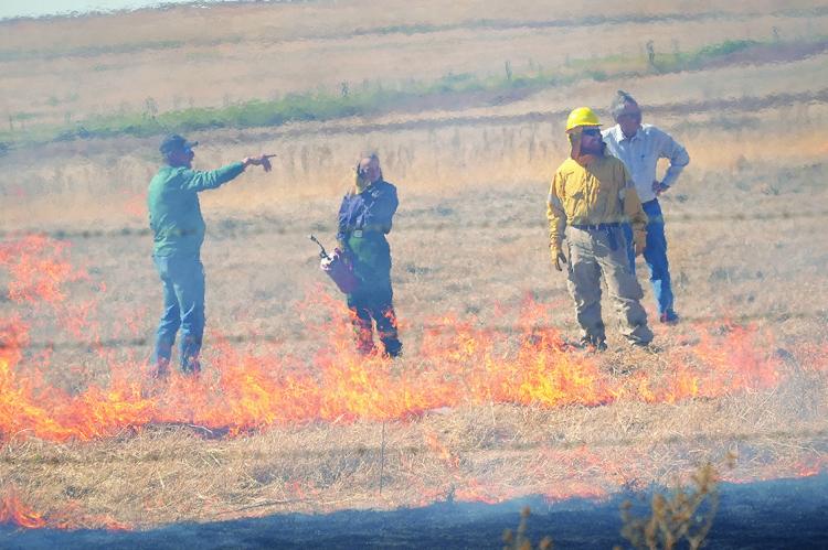 OSU Extension Fire Ecology Specialist John Weir, left, talks with participants of a Fighting Fire with Fire workshop at Greenfield in October. Photo Courtesy / Oklahoma Conservation Commission