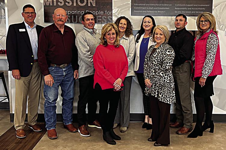 Photo (left to right): Deputy Superintendent Doug Hall, Larry Culwell, Ernie Taylor, Colette Harper, Dara McCoy, Anne Brooks, Betty Ford, Brock Whittington, Superintendent Shelley Free