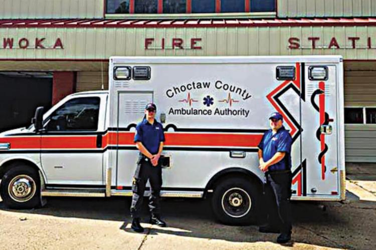 CHOCTAW COUNTY AMBULANCE Authority EMT-Basics Elijah Hubbard and Dalton Mahoney stand outside the Wewoka Fire-EMS station, where they assisted the community following a COVID-19 outbreak.