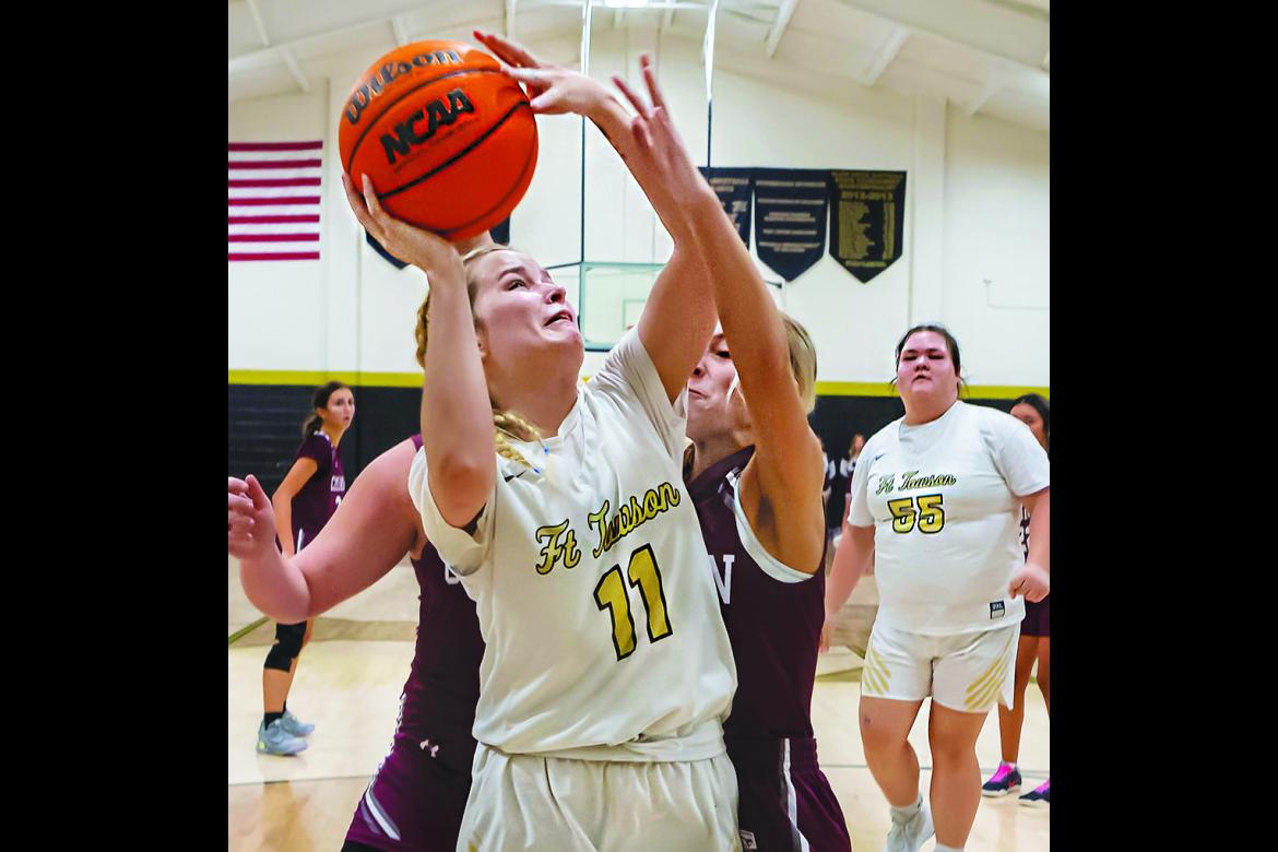 MACKENZIE WYATT battles in the paint for two points for the Lady Tigers in their 41-24 win over the Lady Wildcats. Hugo News Photo / Bobby Hamill