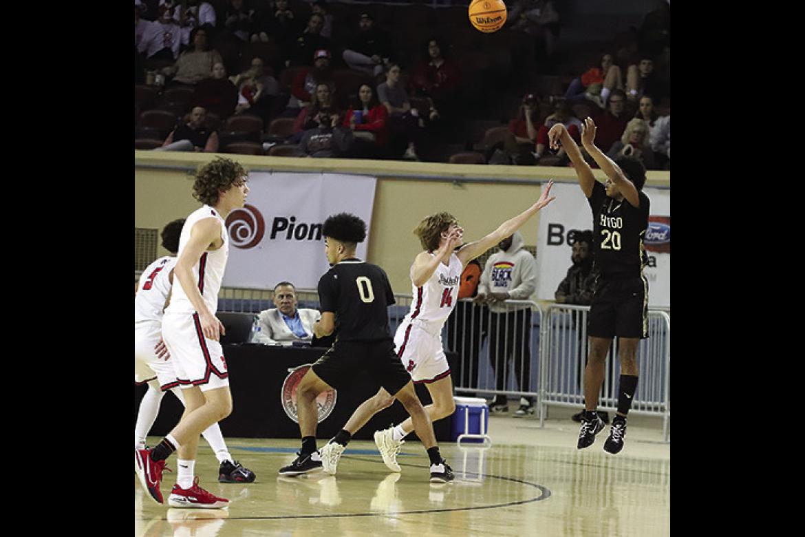 LORENZO KING turns loose of a three-point shot early in last week’s Oklahoma Class 3A Mens Basketball playoffs at the State Fairgrounds stadium in Oklahoma City. The shot was one of only two treys the Buffaloes would score throughout the entire game at the Big House’s last State Championship Tournament. Hugo News Photo / Kelli Stacy