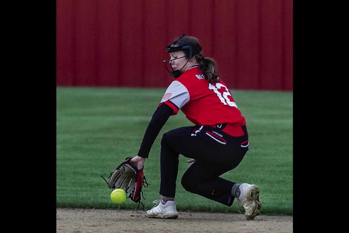 SOPER’S SHY’ANNE WOLFE makes a great back-handed stop from her short stop position to make a key out against the Hugo Lady Buffaloes during last week’s home game at Soper. HUGO NEWS PHOTO / Bobby Hamill