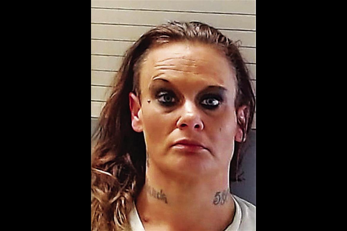 Woman arrested after admitting to arson