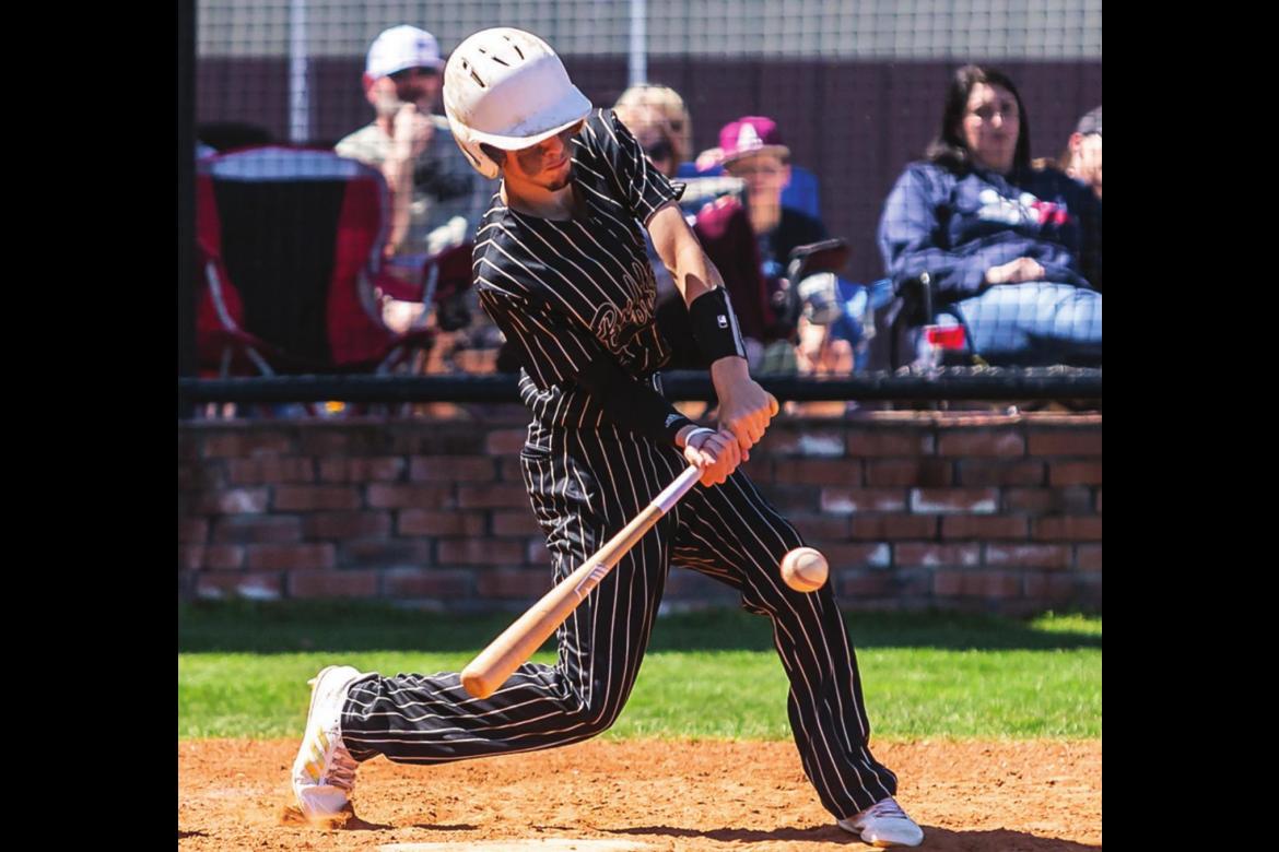 BRENNAN McDONEL makes a swing on a pitch in the lower part of the strike zone to rip a hit for the Hugo Buffaloes during weekend baseball action. Above, McDonel strokes a hit in the Buffaloes’ 12-3 win over Atoka. (Below)